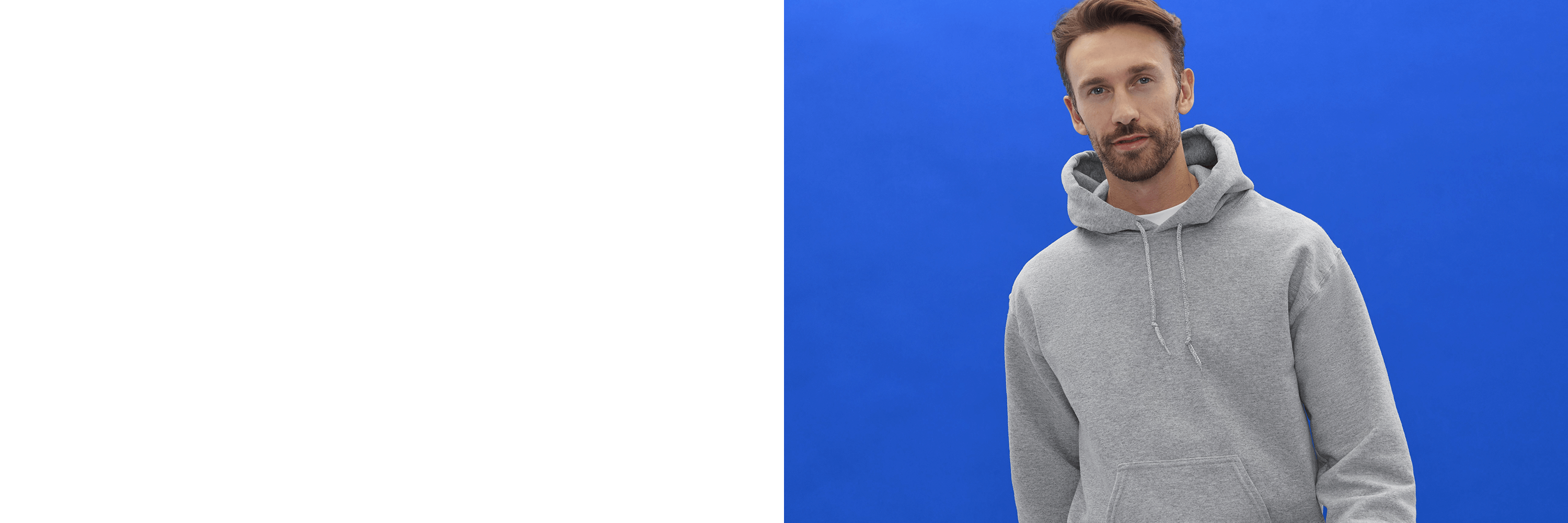 Man wearing a gray hoodie against a blue background
